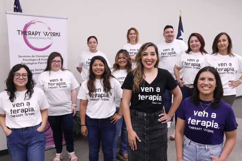 Ana Marcela Rodríguez, center, and Diana Beltran, right, with some of the therapists of...