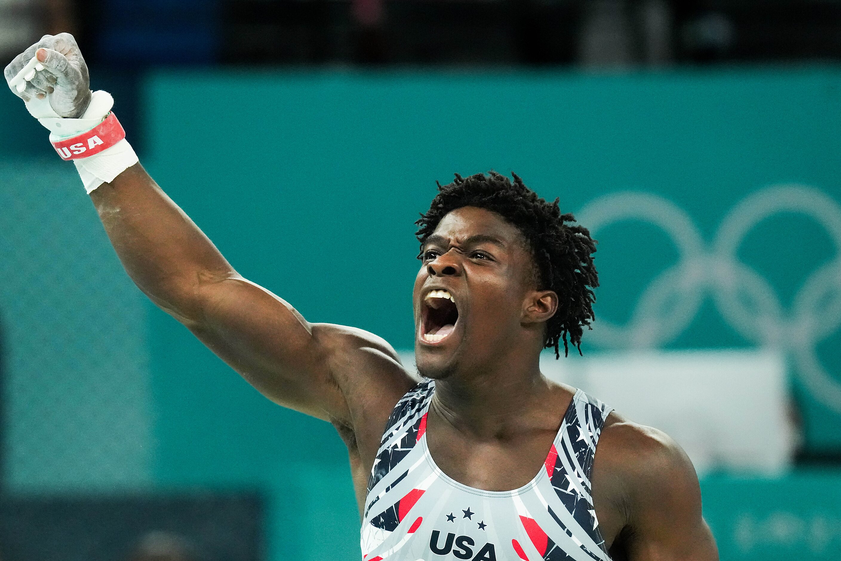 Frederick Richard  of the United States reacts after competing on the rings during the men’s...