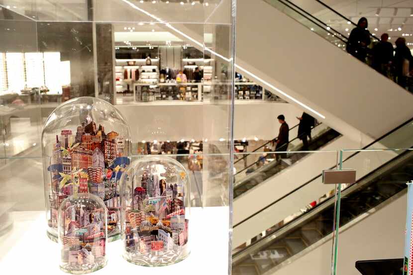 People gather inside Neiman Marcus, at the opening of Hudson Yards in Manhattan, New York on...