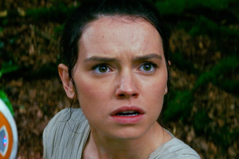  Daisy Ridley, right, as Rey, and BB-8, in "Star Wars: The Force Awakens." 