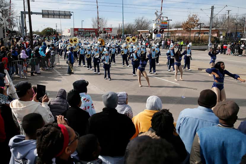 Wilmer Hutchins Marching Music Machine makes their way down Martin Luther King Jr. Blvid....