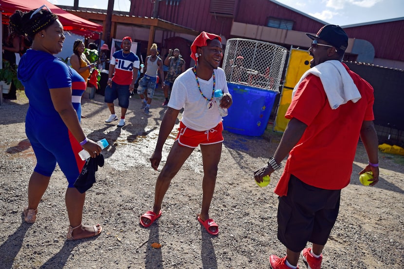 Ashley Williams (left) and Micah Sutton (right) enjoy a dance by Devante Warmack after he...