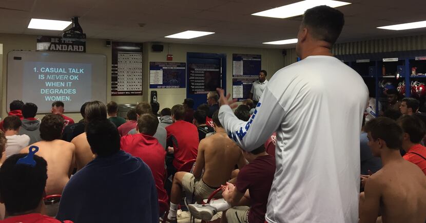 Head coach Randy Jackson talks to the Grapevine High School football team about recently...