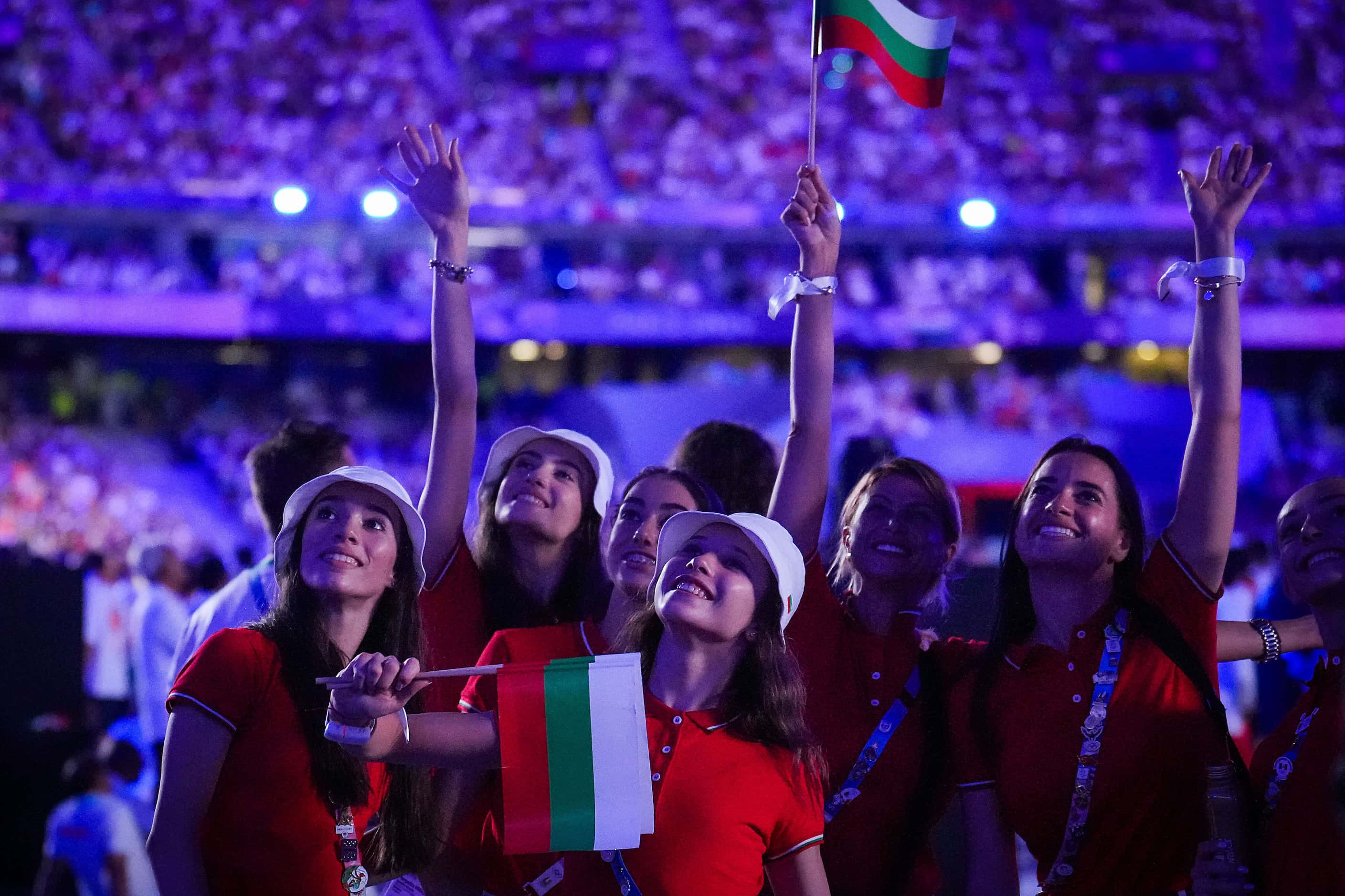 A group of Bulgarian athletes waves to the crowd during closing ceremonies for the 2024...