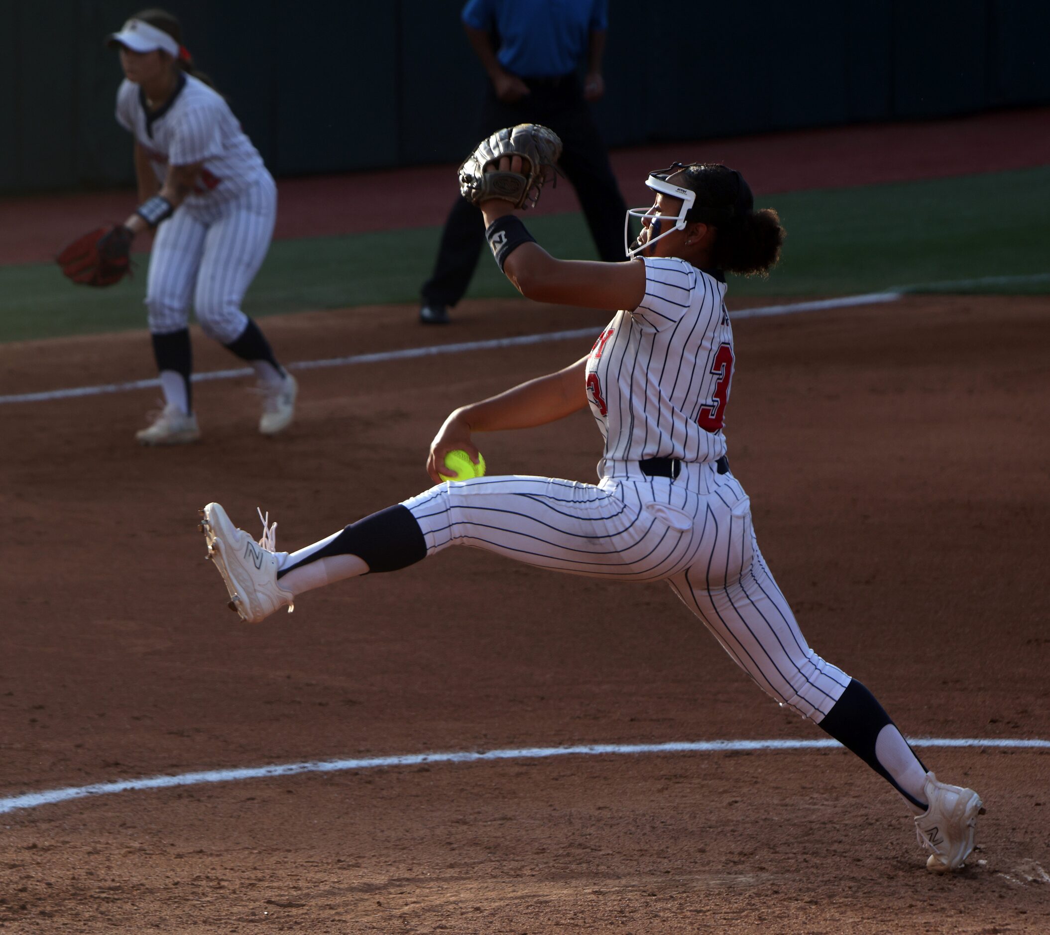 Aubrey pitcher Mya Cherry (3) delivers a pitch to a Corpus Christi Calallen batter during...