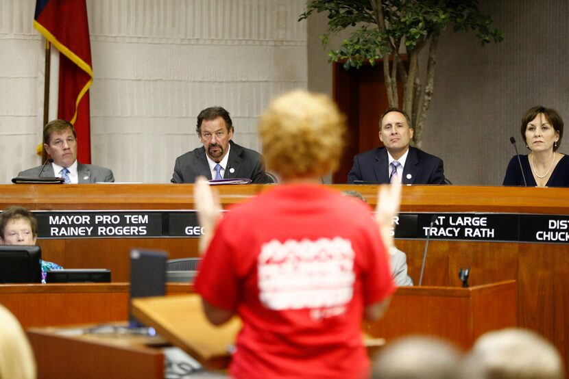 Mayor Pro Tem Rainey Rogers (from left) McKinney Mayor George Fuller, City Manager Paul...