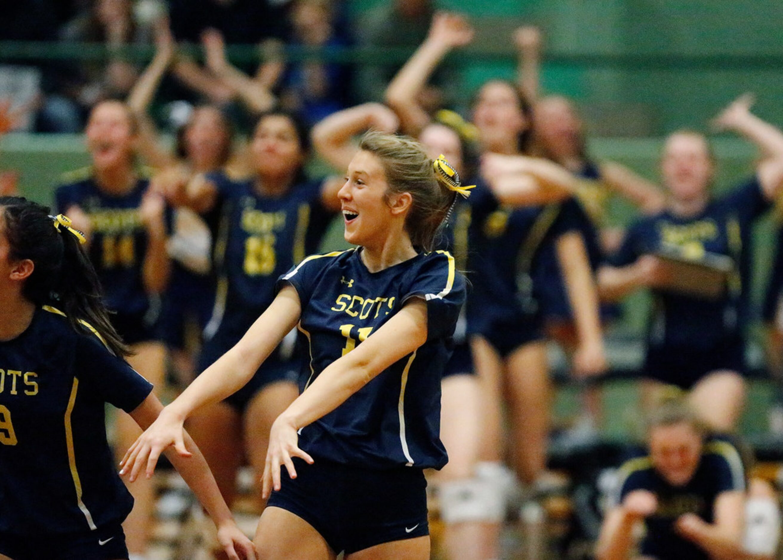 Highland Park High School Sydney Breon (11) celebrates a point in game one as Lovejoy High...