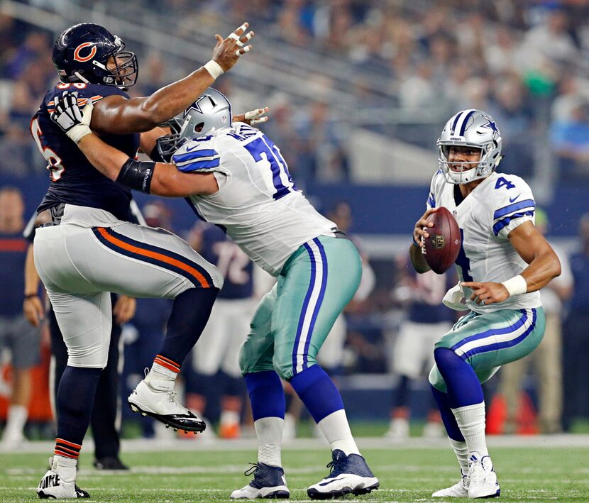 Dallas Cowboys guard Zack Martin (70) blocks Chicago Bears defensive end Akiem Hicks (96)...