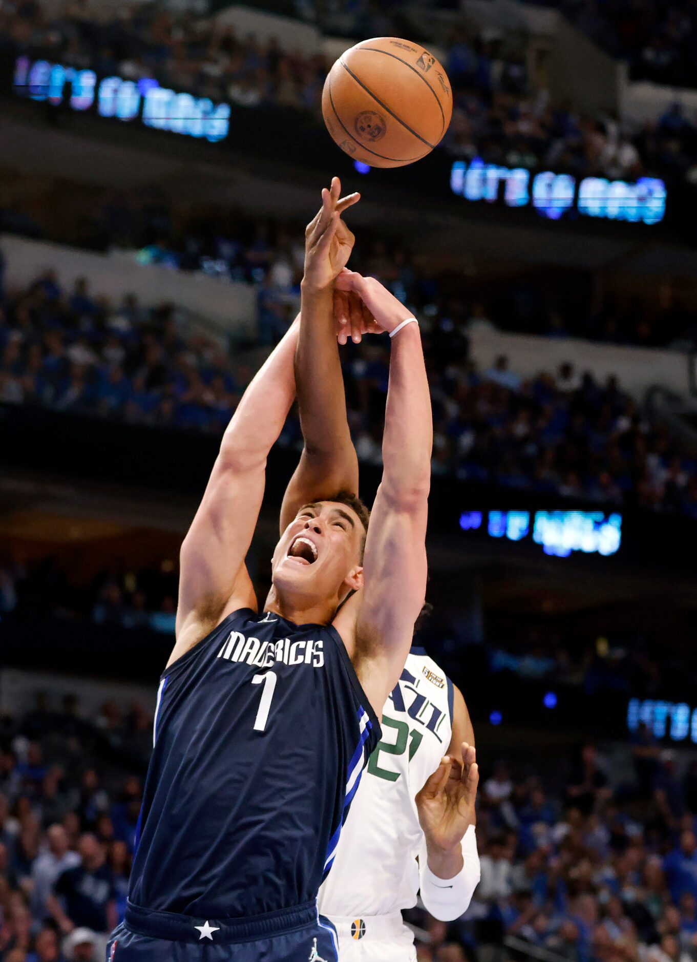 Dallas Mavericks center Dwight Powell (7) goes up for an offensive rebound against Utah Jazz...