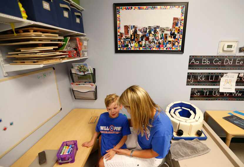Occupational Therapy specialist Julie Bayless works with Will at Keystone Pediatric Therapy...