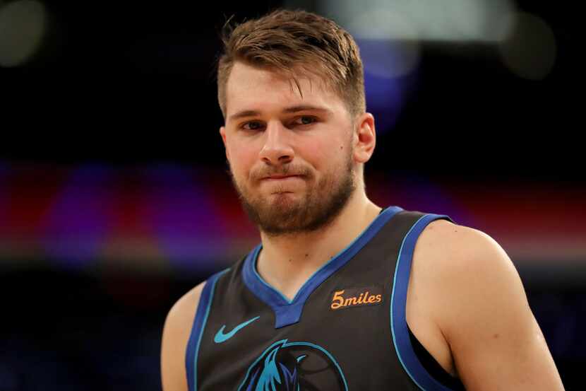 NEW YORK, NEW YORK - JANUARY 30:   Luka Doncic #77 of the Dallas Mavericks reacts in the...