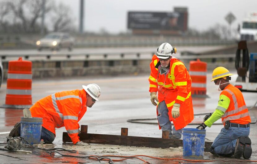 Crews repaired pavement   on eastbound Interstate 20 near Bonnie View Road on Tuesday. Their...