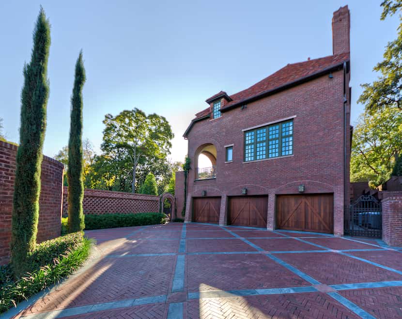 Harold Leidner's team designed a stunning brick pattern on this motor court and driveway to...