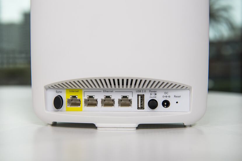 Facing the rear panel of a Wi-Fi router can be daunting if you don't understand where to...
