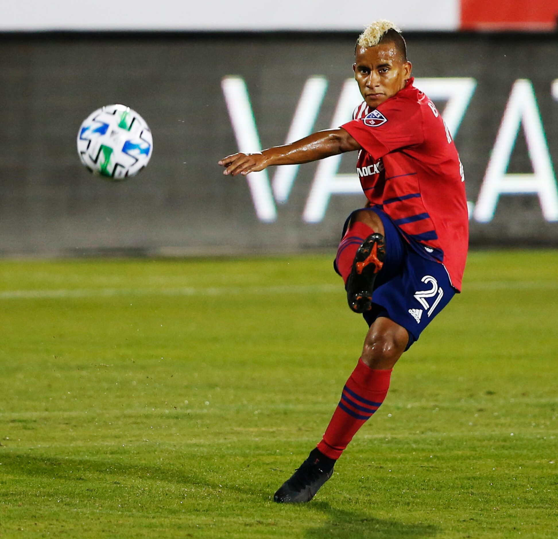 FC Dallas midfielder Michael Barrios (21) passes the ball up field in a game against Orlando...