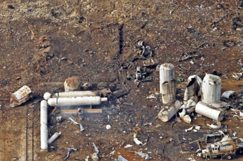 An aerial image shows railroad tracks bent by the April 17 explosion at West Fertilizer.