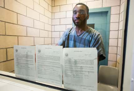 Carl Govan displayed arraignments on his case in August at the Dallas County Jail. Govan is...