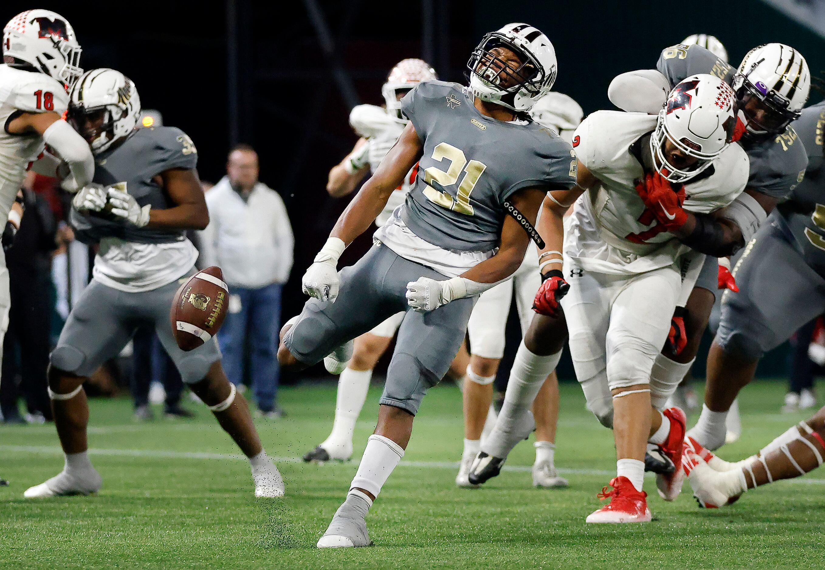 South Oak Cliff running back Danny Green (21) clelbrates after punching in a short touchdown...