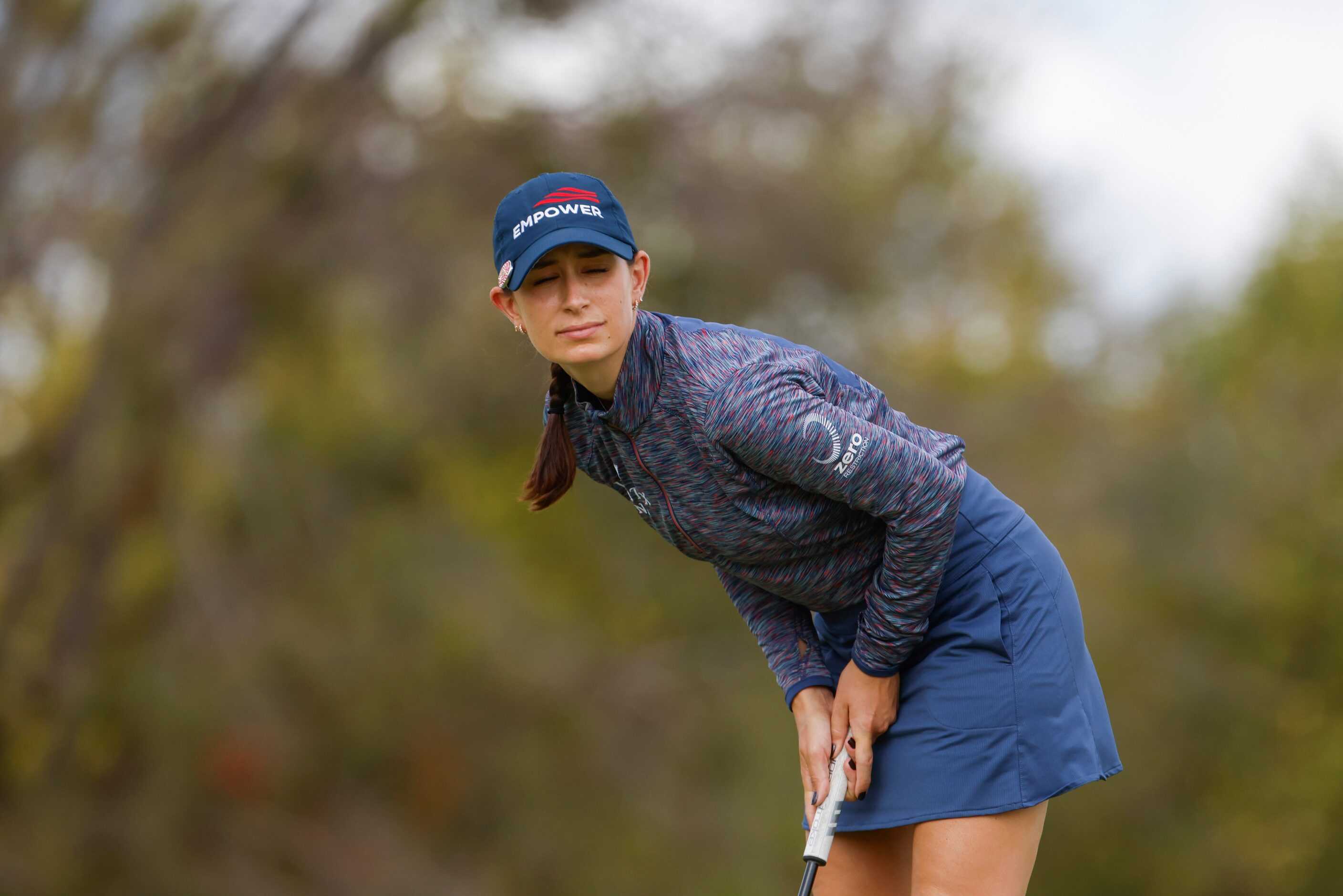 Cheyenne Knight of United States reacts after missing a putt on 10th green during the first...