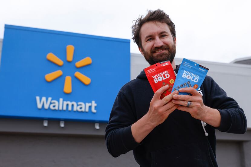 Deric Cahill poses for a portrait with Wicked Bold chocolates at Walmart on Tuesday, April...