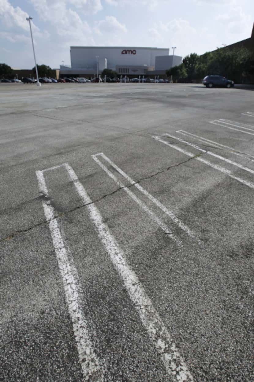 A Valley View Center parking lot stood wide open last summer  as its striping burned away.