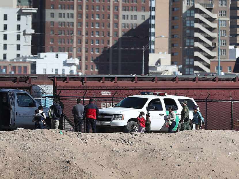 A group of people turn themselves over to U.S. Border Patrol agents as they ask for asylum...