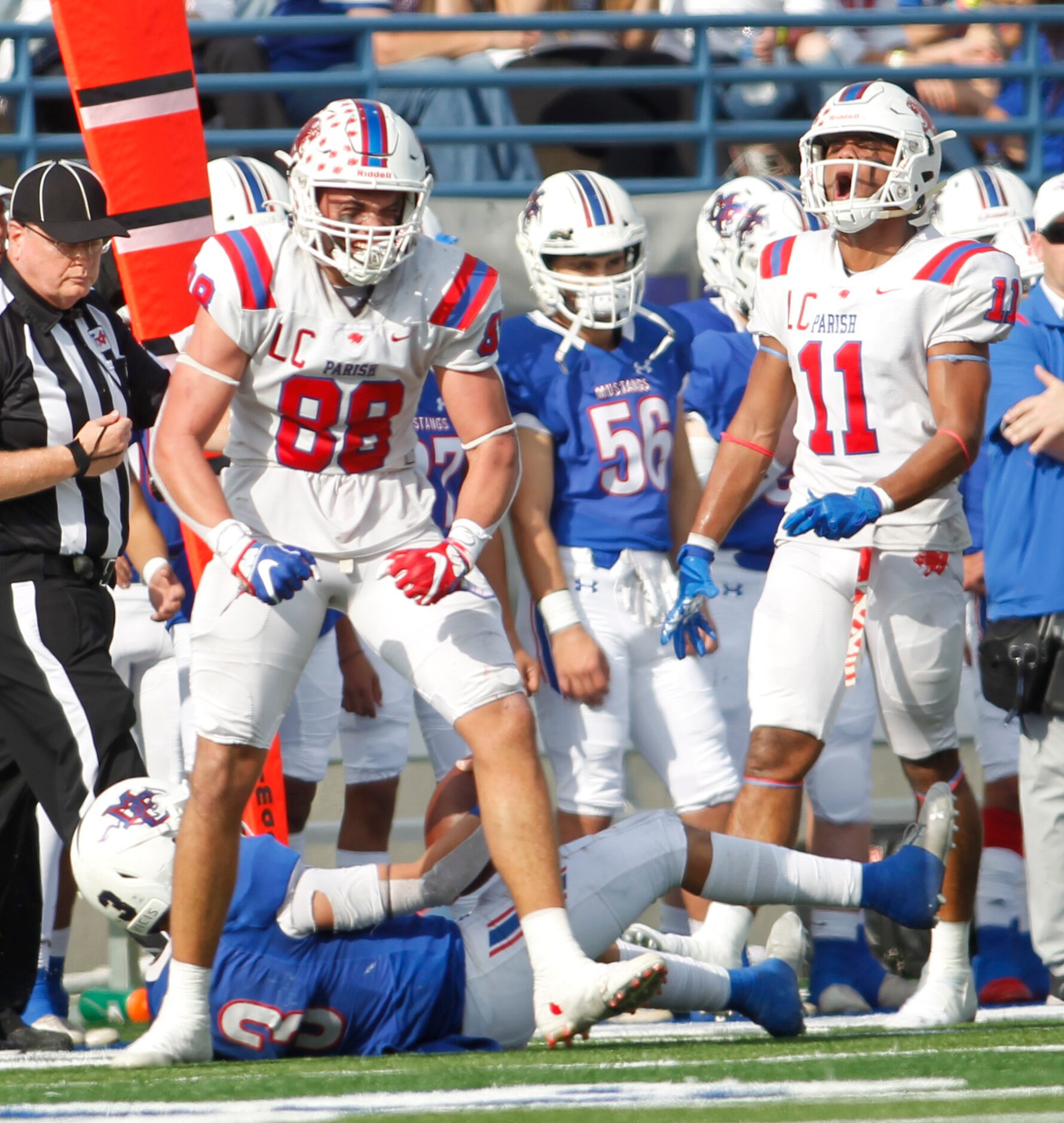 Parish Episcopal defensive lineman Thomas Williams (88) celebrates with defensive back Noah...