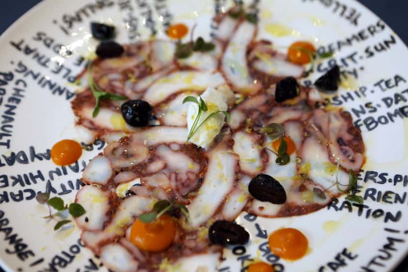 Octopus tiradito with toum, olives and aji amarillo at Cafe Momentum