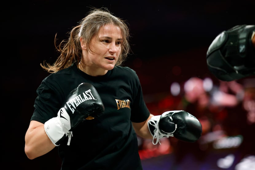 Ireland’s Katie Taylor spars with a trainer during an open workout ahead of her boxing match...