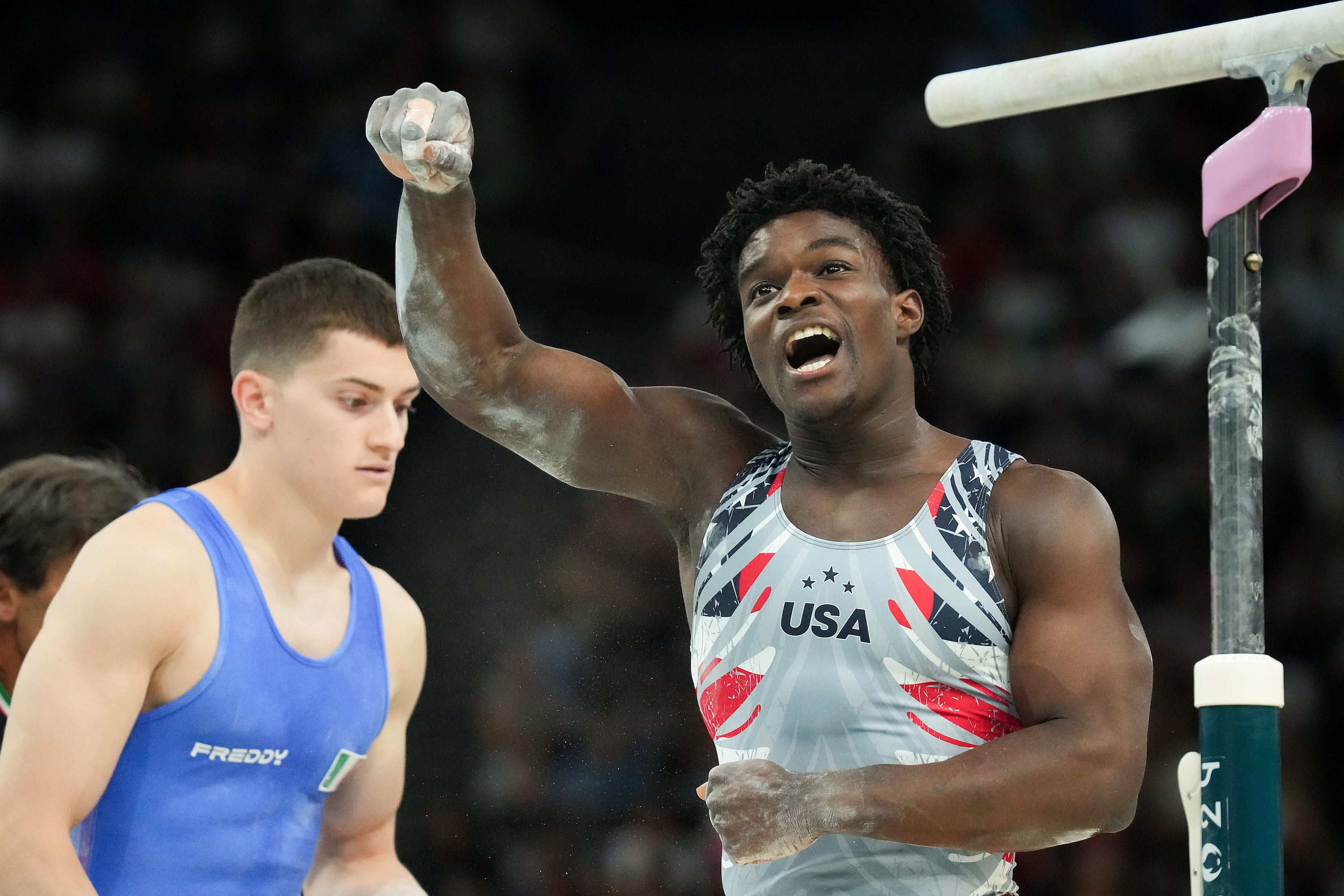 Frederick Richard  of the United States reacts after competing on the parallel bars during...