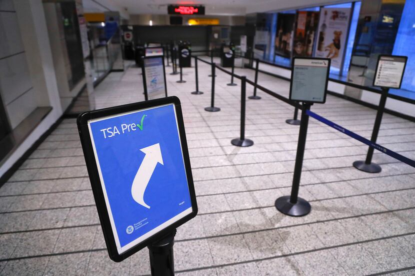 NEW YORK, NY:  A security checkpoint stands empty inside Terminal B at LaGuardia Airport,...