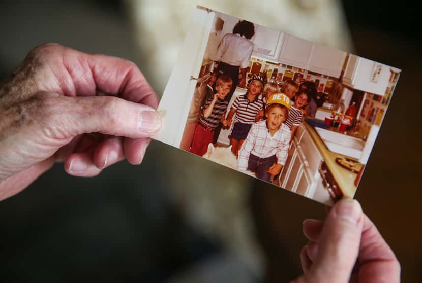 Melissa O'Rourke holds a photograph of her son, presidential hopeful Beto O'Rourke, as a...