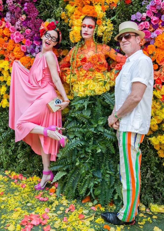 Kendall Morgan and Tim O'Heir pose at the floral wall at the Eye Ball party. (Ron...