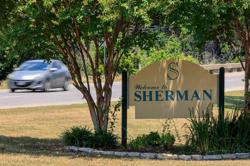 A sign welcomes people to Sherman.