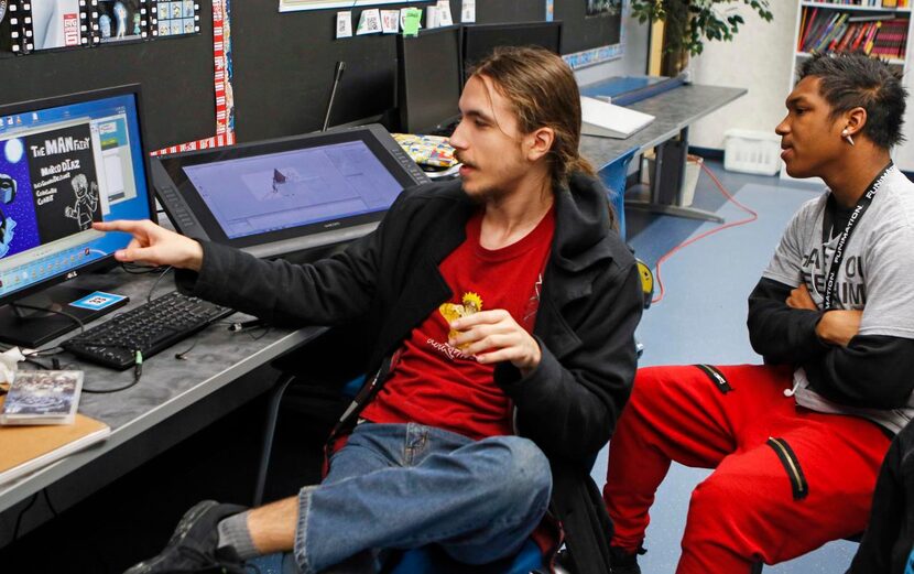 
Allen High School animation students Connor Reiersgord (left) and Reggie Robinson view one...