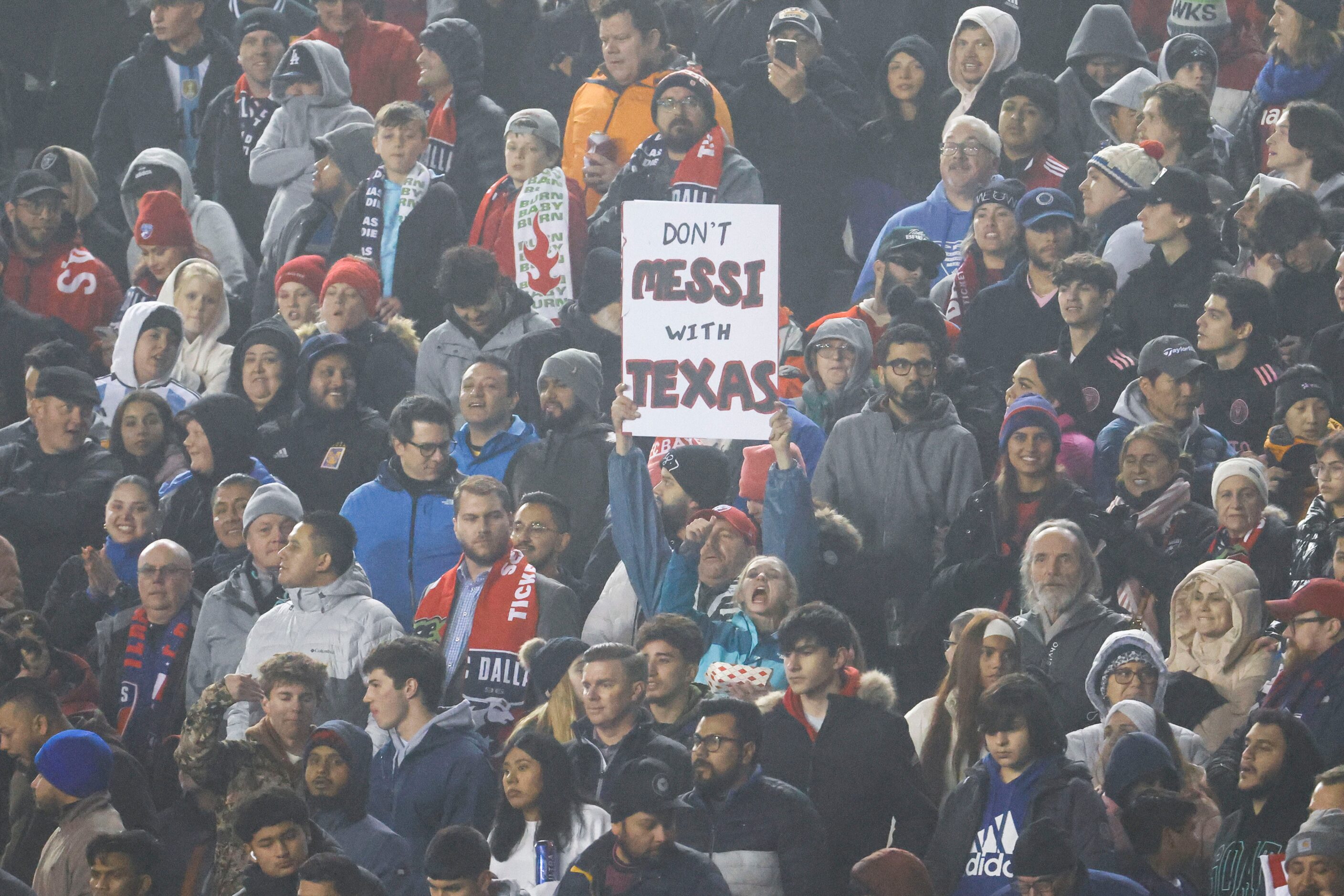 Fans cheer in support of Inter Miami forward Lionel Messi during the second half of a...