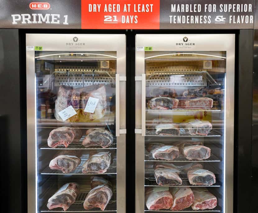 A freezer containing dry aged beef is ready for the store to open Wednesday. The McKinney...
