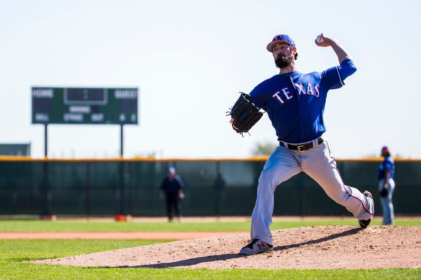 Texas Rangers starting pitcher Cole Hamels (35) pitches live batting practice during a...