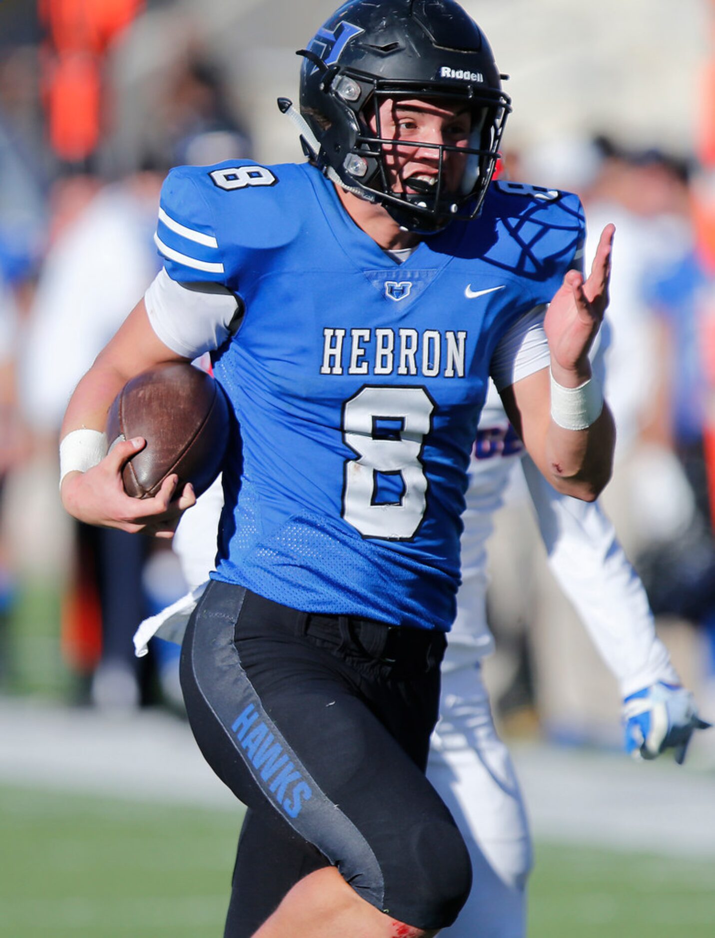 Hebron High School quarterback Carson Harris (8) runs for a touchdown during the fourth...