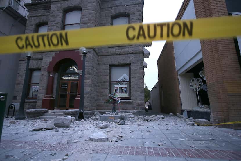 NAPA, CA - AUGUST 24:  Debris sits on the ground in front of a damaged building following a...