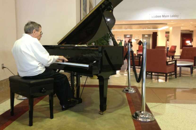 Lucien Leinfelder, an 80-year-old Parkinson’s patient, performs at Texas Health Presbyterian...