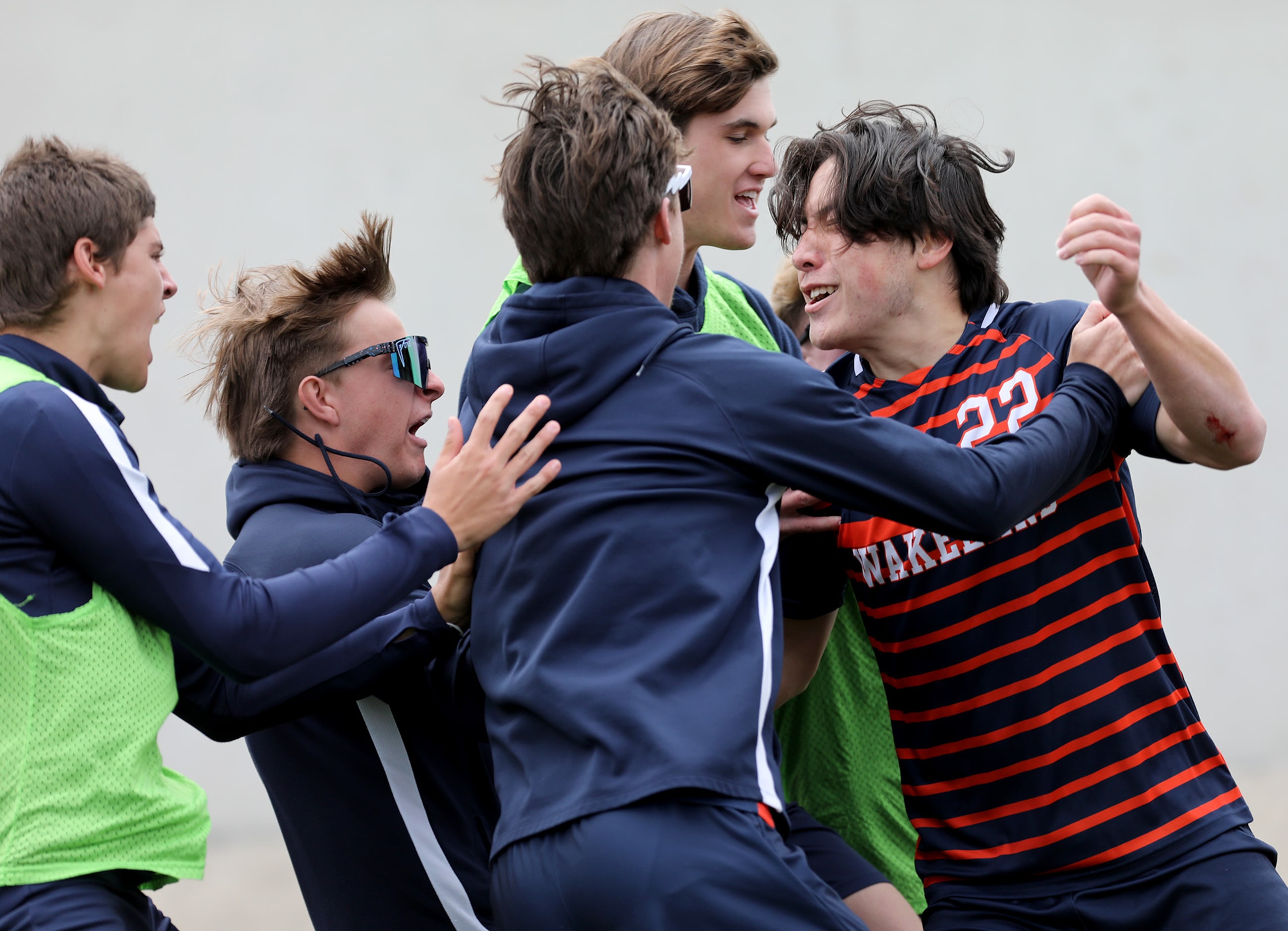 Frisco Wakeland's Brennan Bezdek (22) celebrates with teammates after scoring a goal against...