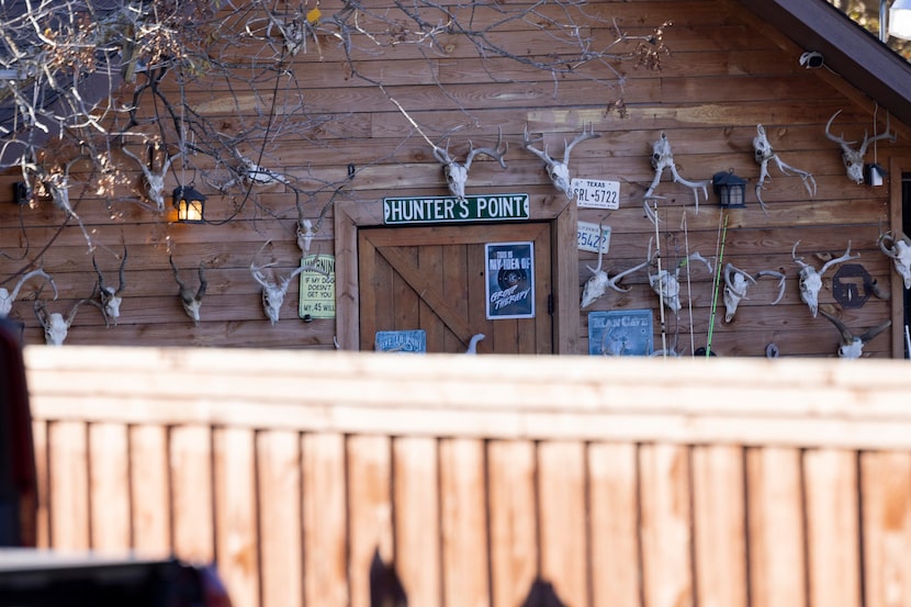 The shed belonging to the next door neighbor of the home where four people, including a...