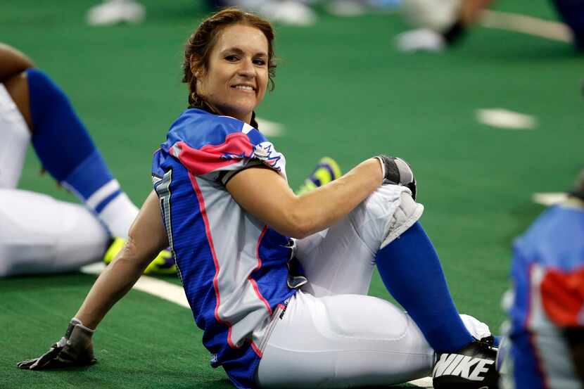 Texas Revolution's Jennifer Welter (47) stretches during warmups before a game against...