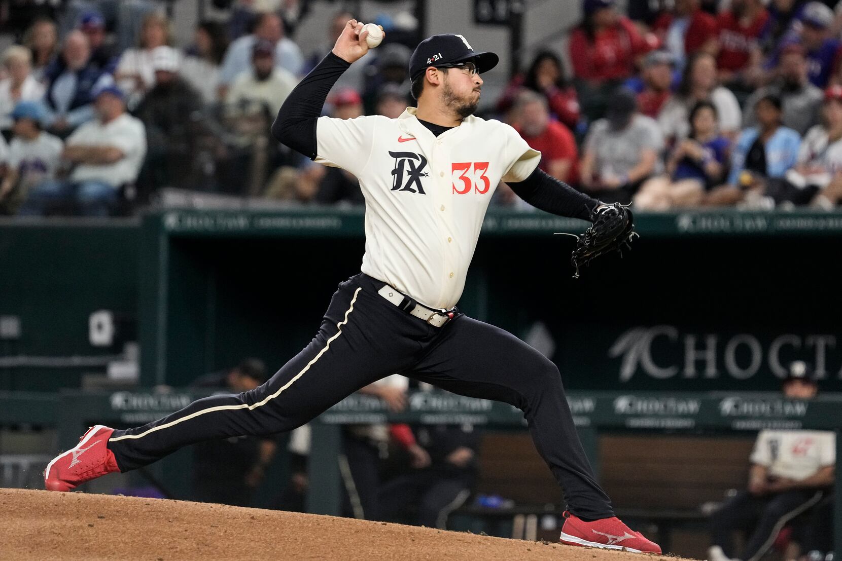 Texas Rangers starting pitcher Nathan Eovaldi prepares to pitch during the  third inning of a baseball game against the New York Yankees, Saturday,  April 29, 2023, in Arlington, Texas. (AP Photo/Sam Hodde