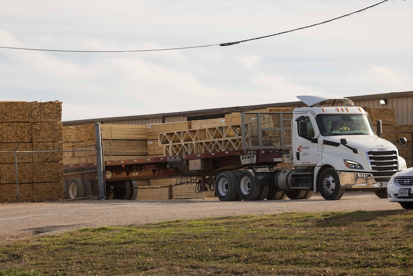 A stack of roof trusses is backed into Noltex Truss, a Grandview-based construction truss...