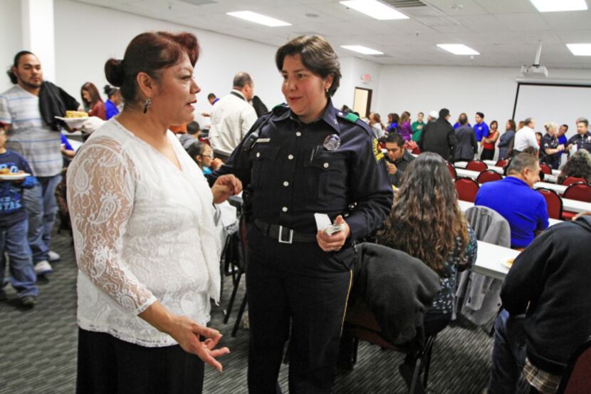 Maria Puente of Pleasant Grove talked with Reserve Officer Ana Arrona after Puente received...