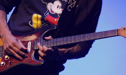 That appears to be Mickey Mouse on John Mayer's shirt at his Dallas concert Saturday at...