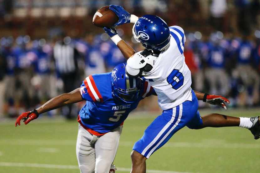 Grand Prairie senior wide receiver Daniel Gomez (9) is unable to make the catch as...