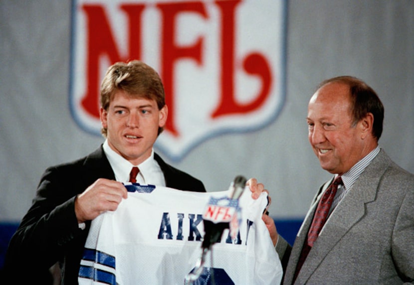 Pete Rozelle, NFL Commissioner, right, began the 54th annual draft of collegiate talent, his...